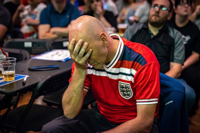 Darts fans, disappointed watching the Euro 2024 final between England and Spain, after the 2024 Betfred World Matchplay Darts at Winter Gardens, Blackpool on July 14, 2024. (Photo by Ian Stephen/ProSports/Rex Features/Shutterstock)