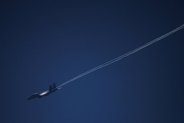 An Israeli war jet flies over the Israel Lebanon border amid ongoing cross-border hostilities between Hezbollah and Israeli forces, in northern Israel on June 12, 2024. (Photo by Gil Eliyahu/Reuters)