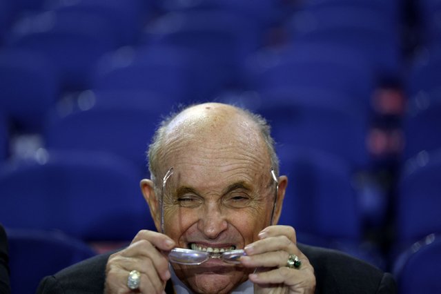 Former Trump lawyer Rudy Giuliani gestures as he attends Day 2 of the RNC in Milwaukee on July 16, 2024. (Photo by Andrew Kelly/Reuters)