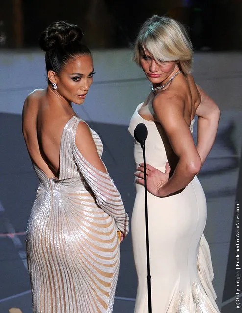 Presenters Jennifer Lopez (L) and Cameron Diaz speak onstage during the 84th Annual Academy Awards held at the Hollywood & Highland Center