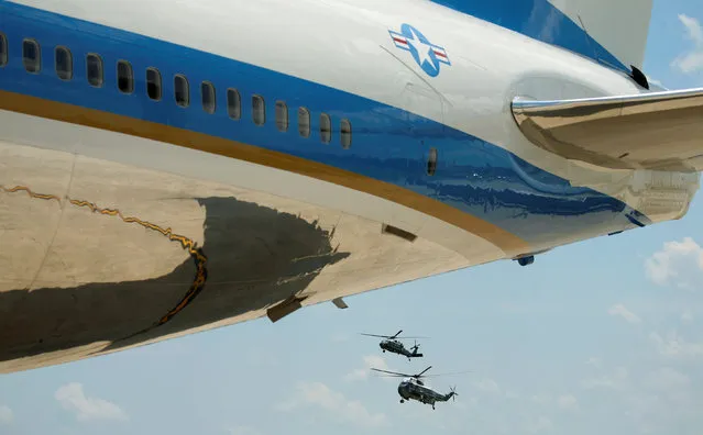 Marine One and a support helicopter cross the tail of Air Force One as U.S. President Barack Obama arrives at Joint Base Andrews in Washington to travel to Elkhart, Indiana June 1, 2016. (Photo by Kevin Lamarque/Reuters)