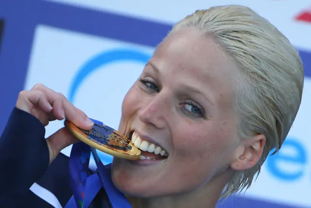 Gold medallist Rachelle Simpson of the U.S. celebrates after the women's 20m high dive competition during the Aquatics World Championships in Kazan, Russia  August 4, 2015. (Photo by Hannibal Hanschke/Reuters)