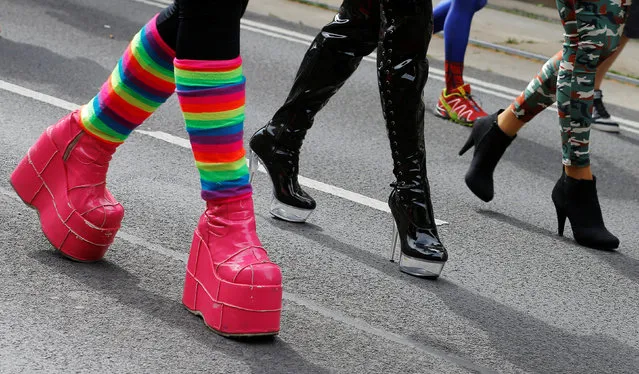Legs of revellers are seen during Regenbogenparade gay pride parade in Vienna, Austria, June 18, 2016. (Photo by Heinz-Peter Bader/Reuters)