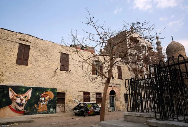 A graffiti, painted on the wall of a house located inside the 15th-century complex built by Mameluk Sultan al-Ashraf Qaitbey, is photographed, in Cairo's City of the Dead, Egypt February 13, 2017. (Photo by Amr Abdallah Dalsh/Reuters)