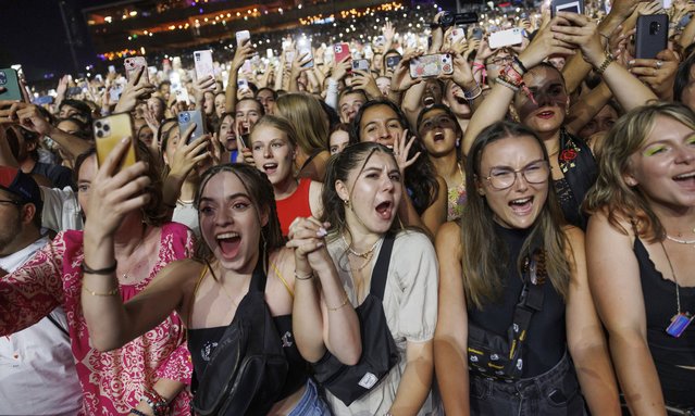 Spectators cheer as Spanish singer Rosalia performing on the main stage, during the 46th edition of the Paleo Festival, in Nyon, Switzerland, Thursday, July 20, 2023. The Paleo is a open-air music festival in the western part of Switzerland with about 250'000 spectators in six days and will take place from 18th to 23rd July. (Photo by Salvatore Di Nolfi/Keystone)