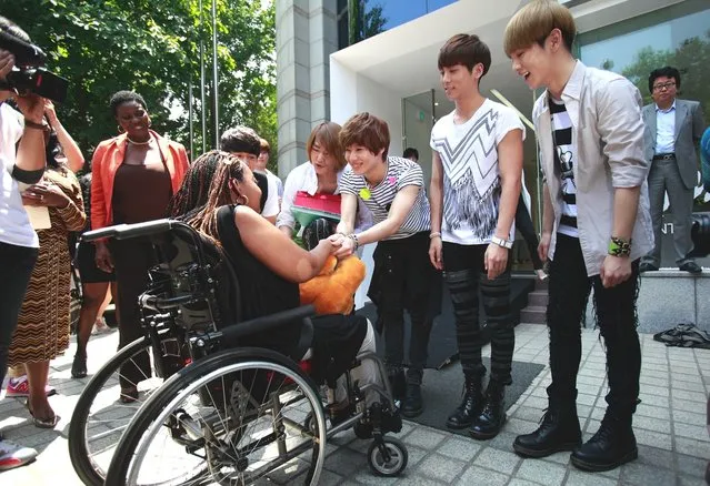 15-year old Terminally Ill American girl Donica Streling meets with members of SHINee (샤이니) at SM Entertainment head office on June 20, 2012 in Seoul, South Korea