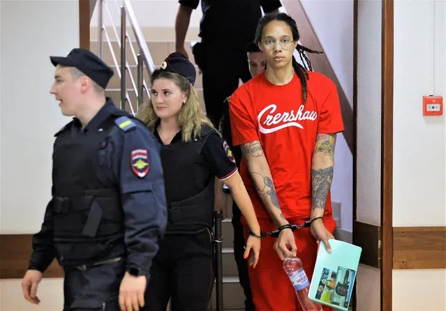 U.S. basketball player Brittney Griner, who was detained in March at Moscow's Sheremetyevo airport and later charged with illegal possession of cannabis, is escorted before a court hearing in Khimki, outside Moscow, Russia on July 7, 2022. (Photo by Evgenia Novozhenina/Reuters)