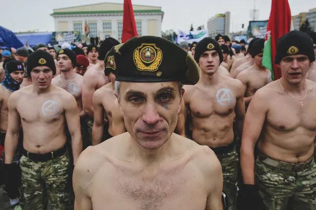 A participant before the start of of the “Real Men Race” in Minsk. About 3,000 men took part in the men-only event on Belarus's Defender of the Fatherland Day on February 23, 2019. (Photo by Uladz Hrydzin/Radio Free Europe/Radio Liberty)