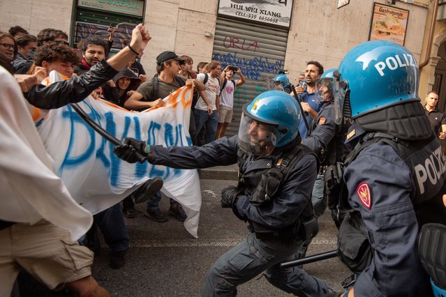 Students rally against the prime minister, Giorgia Meloni, as she speaks at the closing session of the second festival of autonomous regions and provinces in Turin, Italy on October 3, 2023. (Photo by Marco Alpozzi/LaPresse/Rex Features/Shutterstock)