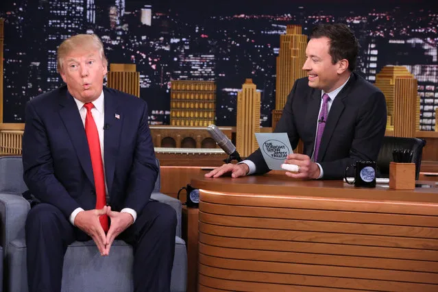 In this image released by NBC, Republican presidential candidate Donald Trump, left, appears with host Jimmy Fallon during a taping of “The Tonight Show Starring Jimmy Fallon”, on Friday, September 11, 2015, in New York. (Photo by Douglas Gorenstein/NBC via AP Photo)