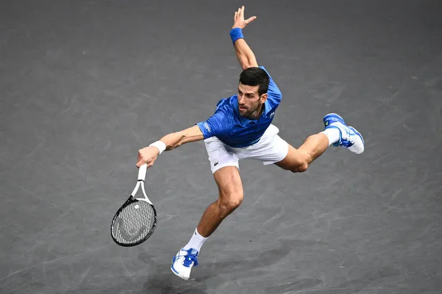 Serbia's Novak Djokovic returns the ball during the men's singles semi-final tennis match between Serbia's Novak Djokovic and Greece's Stefanos Tsitsipas on day 6 of the ATP World Tour Masters 1000 – Paris Masters (Paris Bercy) – indoor tennis tournament at The AccorHotels Arena in Paris on November 5, 2022. (Photo by Christophe Archambault/AFP Photo)