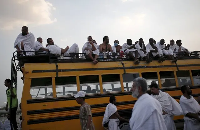 Muslim pilgrims travel on buses at Arafat during the annual haj pilgrimage, outside the holy city of Mecca September 23, 2015. (Photo by Ahmad Masood/Reuters)