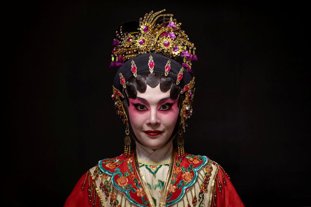 Rika Woo, 31, a Cantonese opera performer and a captain of an underground J-pop style idol group, poses for photos dressed in traditional Cantonese opera attire in Hong Kong, China on September 17, 2024. (Photo by Tyrone Siu/Reuters)