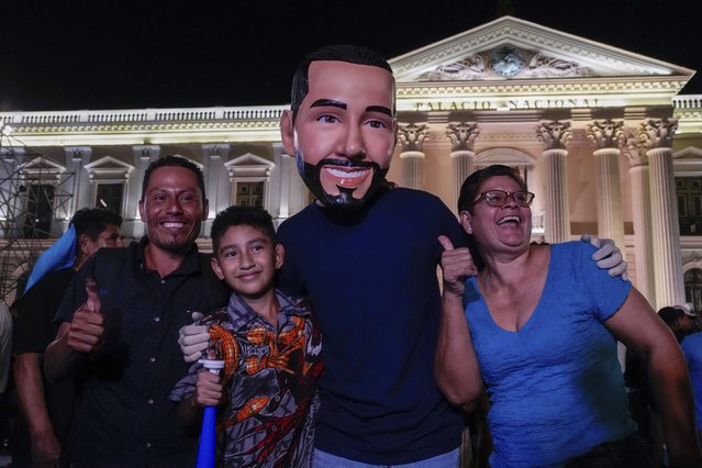 Supporters of Salvador President Nayib Bukele, who is seeking re-election, celebrate results of a general election in downtown San Salvador, El Salvador, Sunday, February 4, 2024. (Photo by Moises Castillo/AP Photo)