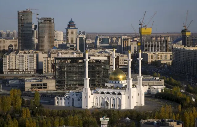 A general view of downtown with Nur-Astana Mosque (front) in Astana, Kazakhstan, October 8, 2015. (Photo by Shamil Zhumatov/Reuters)