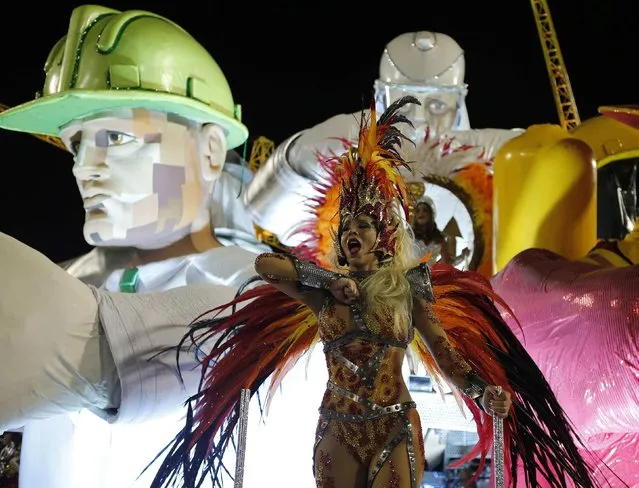 A reveller from Grande Rio samba school participates during the annual Carnival parade in Rio de Janeiro's Sambadrome, February 12, 2013. (Photo by Sergio Moraes/Reuters)