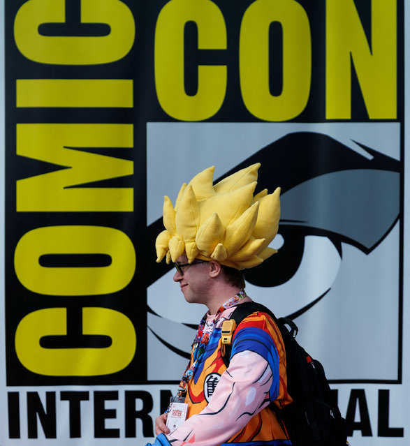 An attendee arrives in costume for the opening day of Comic-Con International in San Diego, California, U.S. July 24, 2025. (Photo by Mike Blake/Reuters)
