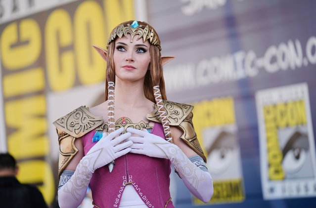 Allison Tabitha, of Orlando, Fla., dressed as Zelda from the “Legend of Zelda” video game, poses for photographers before the 2025 Comic-Con International Preview Night on Wednesday, July 23, 2025, in San Diego. (Photo by Chris Pizzello/AP Photo)