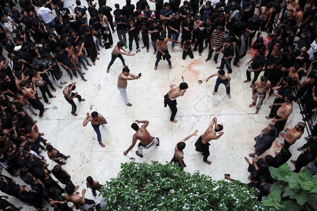  Shi'ite Muslims use razors to flagellate themselves during the commemoration of Ashura, the holiest day on the Shi'ite Muslim calender, in New Delhi, India, on July 6, 2025. (Photo by Bhawika Chhabra/Reuters)