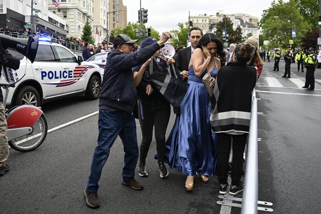 Protesters try to block arriving guests as demonstrators gather to protest the attacks in Gaza and show support for Palestinians by chanting slogans outside the Washington Hilton, the site of the annual White House Correspondents' Dinner in Washington, D.C., United States on April 27, 2024. (Photo by Celal Gunes/Anadolu via Getty Images)