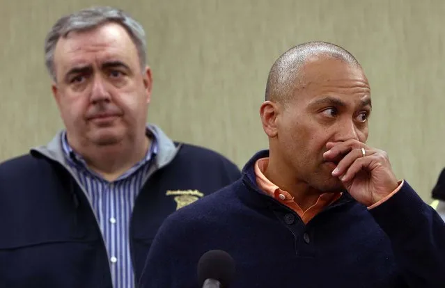 Massachusetts Gov. Deval Patrick pauses as he speaks about the explosions during a newsess conference as Boston Boston Police Commissioner Edward Davis, left, looks on, Monday, April 15, 2013, in Boston. (Photo by Bizuayehu Tesfaye/AP Photo)