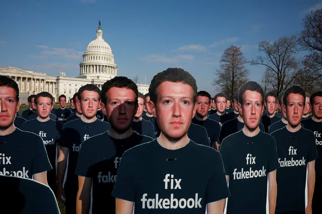 Dozens of cardboard cutouts of Facebook CEO Mark Zuckerberg are seen during an Avaaz.org protest outside the U.S. Capitol in Washington, U.S., April 10, 2018. (Photo by Aaron P. Bernstein/Reuters)