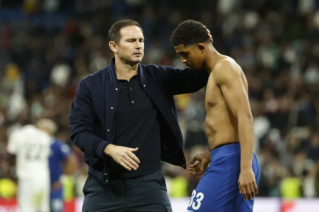 Chelsea´s head coach Frank Lampard conforts Wesley Fofana (R) at the end of the UEFA Champions League quarter final first leg soccer match between Real Madrid and Chelsea FC, in Madrid, Spain, 12 April 2023. (Photo by Chema Moya/EPA)