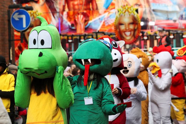 People in costumes attend the Lunar New Year celebrations in Manchester, Britain, on February 2, 2025. (Photo by Temilade Adelaja/Reuters)