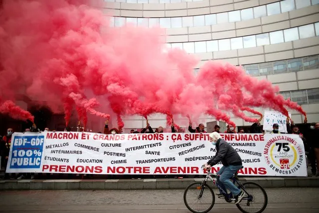 Demonstrators attend a protest called by healthcare and social workers' labour unions, as part of a day of strikes and protests against the government's economic and social policies, during the coronavirus disease (COVID-19) outbreak in Paris, France, April 8, 2021. (Photo by Benoit Tessier/Reuters)