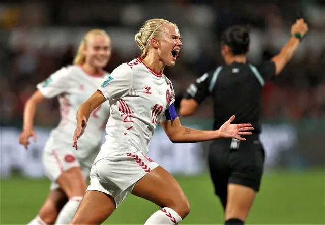 Denmark's forward #10 Pernille Harder celebrates scoring her team's first goal during the Australia and New Zealand 2023 Women's World Cup Group D football match between Haiti and Denmark at Perth Rectangular Stadium in Perth on August 1, 2023. (Photo by Luisa Gonzalez/Reuters)