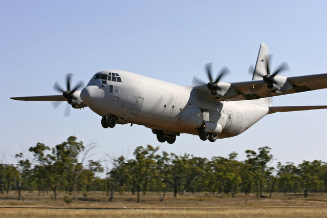 In this photo provided by the Australian Defence Force a AC-130 Hercules aircraft practices landing on the dirt airstrip at Benning Field during Exercise Northern Station 2007 near Townsville, Australia, September 25, 2007. Australia said Monday, July 24, 2023, it will buy 20 new C-130 Hercules from the United States in a 9.8 billion Australian dollar ($6.6 billion) deal that will increase by two-thirds the size of the Australian air force’s fleet of its second-largest heavy transport aircraft. (Photo by ADF via AP Photo)