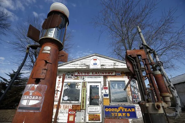 An old closed up gas station is seen in Belle Plaine, Iowa, March 8, 2015. (Photo by Jim Young/Reuters)