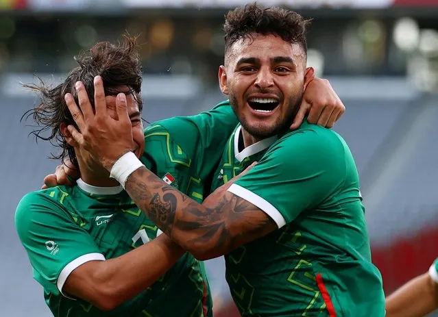 Diego Lainez of Team Mexico (L) celebrate his goal with teammate Alexis Vega in the Men's First Round Group A match during the Tokyo 2020 Olympic Games at Tokyo Stadium on July 22, 2021 in Chofu, Tokyo, Japan. (Photo by Edgar Su/Reuters)