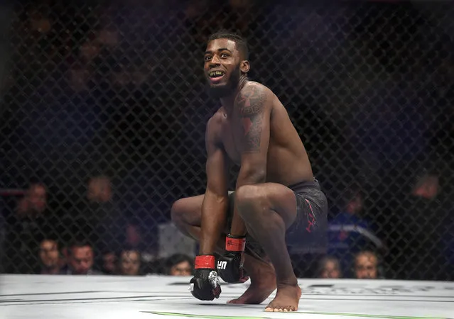 Devonte Smith of the U.S., celebrates after defeating South Korea's Dong Hyun Ma during their lightweight bout at the UFC 234 event in Melbourne, Australia, Sunday, February 10, 2019. (Photo by Andy Brownbill/AP Photo)