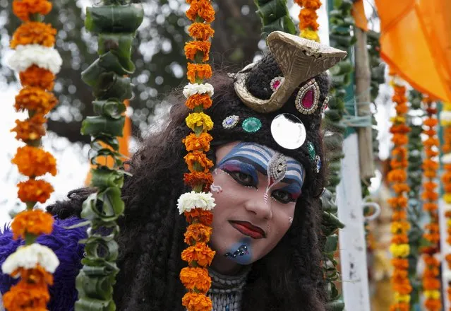 A man dressed as Hindu god Lord Shiva takes part in a religious procession ahead of Maha Shivratri festival in Chandigarh, India, March 5, 2016. (Photo by Ajay Verma/Reuters)