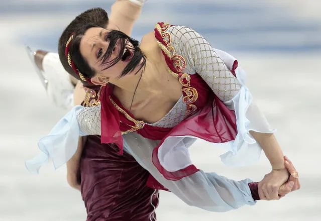 Charlene Guignard and Marco Fabbri of Italy compete in the team free ice dance figure skating competition at the Iceberg Skating Palace during the 2014 Winter Olympics, Sunday, February 9, 2014, in Sochi, Russia. (Photo by Ivan Sekretarev/AP Photo)