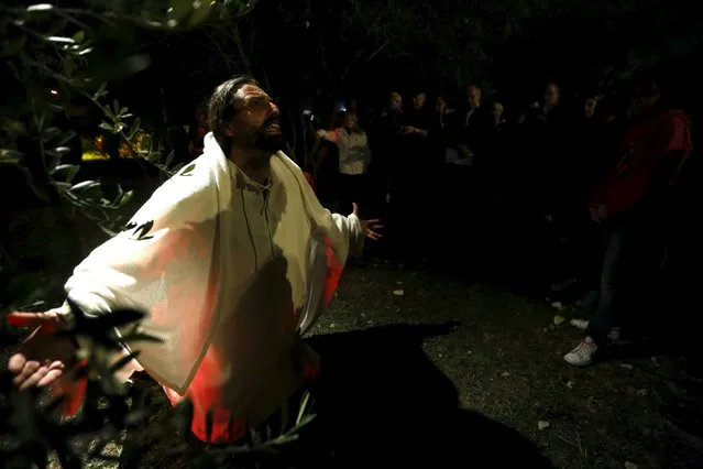 An actor portraying Jesus Christ takes part in the interactive street-theatre Passion play “Il-Mixja” (The Way), one of a series of Holy Week activities in the run-up to Easter, in the grounds of Mount Carmel Mental Hospital in Attard, outside Valletta, Malta, March 22, 2016. (Photo by Darrin Zammit Lupi/Reuters)