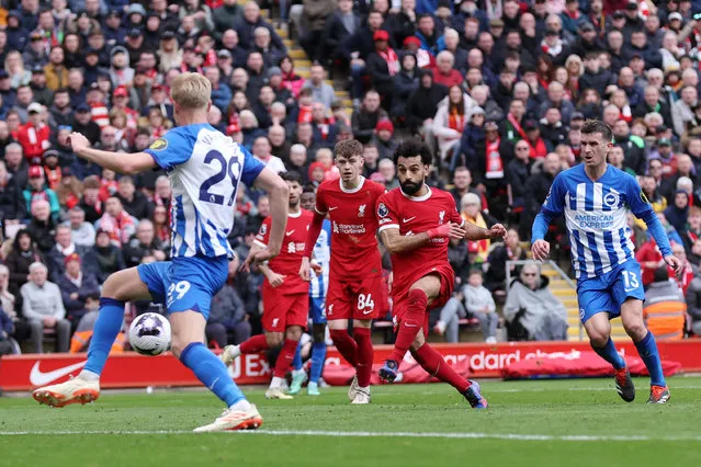 Mohamed Salah of Liverpool scores his team's second goal during the Premier League match between Liverpool FC and Brighton & Hove Albion at Anfield on March 31, 2024 in Liverpool, England. (Photo by Alex Livesey/Getty Images) (Photo by Alex Livesey/Getty Images)
