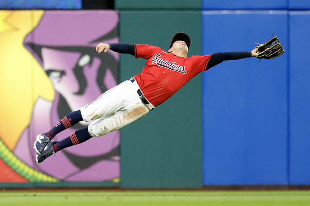 Tyler Freeman #2 of the Cleveland Guardians makes a leaping catch on a ball off the bat of Tyler O'Neill of the Boston Red Sox in the seventh inning at Progressive Field on April 23, 2024 in Cleveland, Ohio. (Photo by Ron Schwane/Getty Images/AFP Photo)