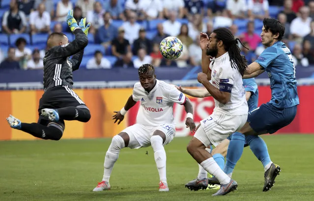 Lyon's Jason Denayer, center right, fails to score during the group G Champions League soccer match between Lyon and Zenit St Petersburg at the Lyon Olympic Stadium in Lyon, France, Tuesday, September 17, 2019. (Photo by Laurent Cipriani/AP Photo)