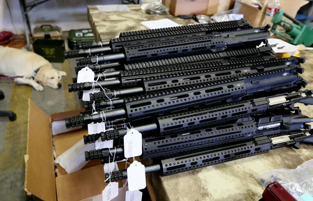 Completed upper carriers for AR-15 assault rifles prepare to be packed for shipping at Ares Armor’s installation facility in Oceanside, Calif. Karras is not licensed to sell firearms and points out that no guns in his store are for sale – only the parts to make them, an experience with edgy appeal that he says is “very cool” and represents the difference between buying a house or building your own. (Photo by Sandy Huffaker for The Washington Post)