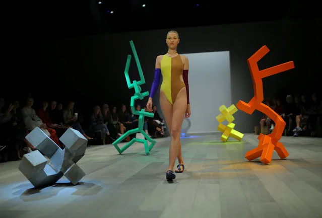 A model for independent fashion label Pageant walks among geometric sculptures during a runway show at Fashion Week Australia in Sydney on May 16, 2017. (Photo by Steven Saphore/Reuters)