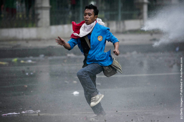 Indonesian students clash with police during protests against planned fuel price hikes in Jakarta, Indonesia