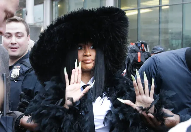 Rapper Belcalis Marlenis Almánzar, known professionally as Cardi B arrives at Queens Criminal Court on December 10, 2019 in New York City to answer charges over strip club incident. Cardi B has been charged in a 14-count indictment, including two counts of felony attempted assault on two bartenders at Angels Strip Club in the Flushing section of Queens. (Photo by John Angelillo/UPI/Barcroft Media)