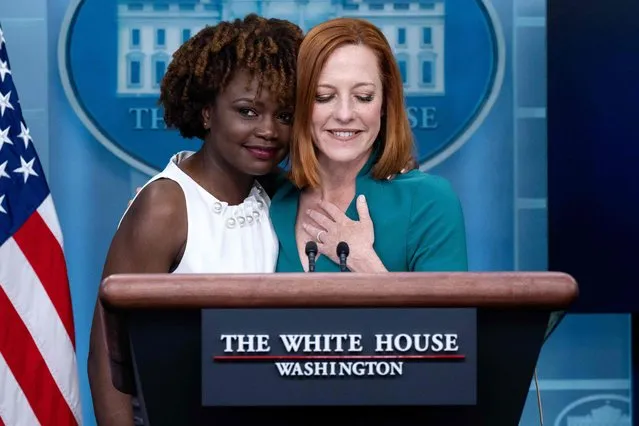 White House Press Secretary Jen Psaki (R) is hugged by current Principal Deputy Press Secretary Karine Jean-Pierre during a press briefing in the Brady Press Briefing Room of the White House in Washington, DC, May 5, 2022, after it was announced Psaki would step down from her role next week and be replaced by Jean-Pierre. US President Joe Biden on May 5, 2022 named Karine Jean-Pierre as the next White House press secretary, the first Black woman to hold the high-profile post. Jean-Pierre, who will also be the first openly LGBTQ+ person in the role, will replace Jen Psaki, under whom she served as deputy, from May 13, according to a White House statement. (Photo by Saul Loeb/AFP Photo)