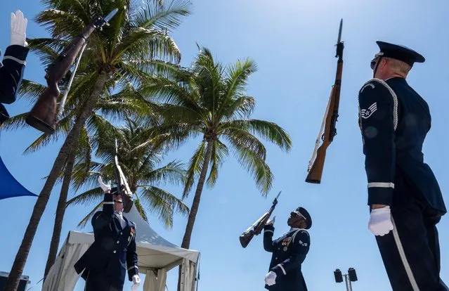 Members of the US Air Force Honor Guard drill team performs in Ocean Drive during the Memorial Day weekend in Miami Beach, Florida, USA, 28 May 2022. The National Salute to America’s Heroes featuring the Hyundai Air & Sea Show is held on on 28-29 May as part of the Memorial Day weekend celebrations in Miami Beach. (Photo by Cristobal Herrera-Ulashkevich/EPA/EFE)