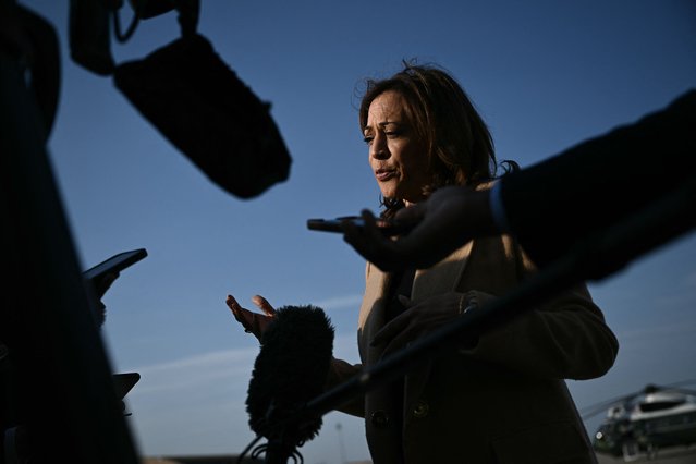 US Vice President and Democratic presidential candidate Kamala Harris speaks to the press before boarding Air Force Two at Joint Base Andrews in Maryland on October 12, 2024. Harris travels to North Carolina for a campaign event on October 13. (Photo by Brendan Smialowski/Pool via AFP Photo)