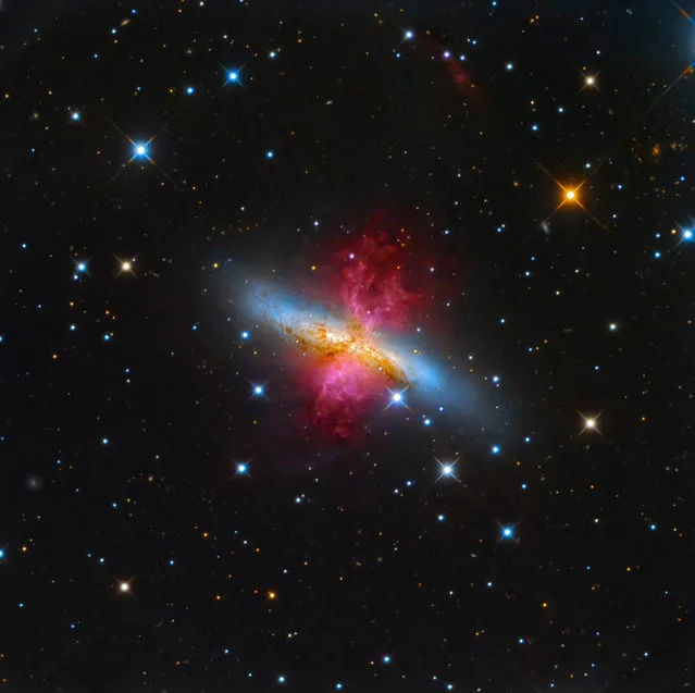 “M82: Starburst Galaxy with a Superwind”. About 12 million light years away from our planet, lies the starburst galaxy M82, also known as the Cigar Galaxy. In a show of radiant red, the superwind bursts out from the galaxy, believed to be the closest place to our planet in which the conditions are similar to that of the early universe, where a plethora of stars are forming. (Photo by Leonardo Orazi/Royal Observatory Greenwich’s Astronomy Photographer of the Year 2016/National Maritime Museum)