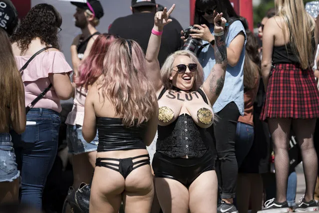 Participants in the 3rd Annual Amber Rose SlutWalk in Los Angeles, California. October 1, 2017. The event seeks to highlight issues such as: gender equality, ending rape culture, victim blaming and body shaming. (Photo by Ronen Tivony/NurPhoto via Getty Images)