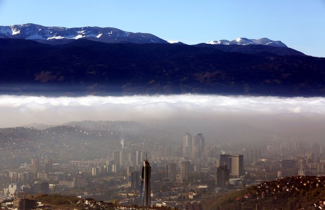 General view of the surroundings of the city of Sarajevo, Bosnia and Herzegovina, 13 November 2023. With an AQI (Air Quality Index) of 157, which is labeled as 'unhealthy', the Bosnian capital is among the most polluted cities in the world, ranking in 6th place on 13 November 2023. (Photo by Fehim Demir/EPA)